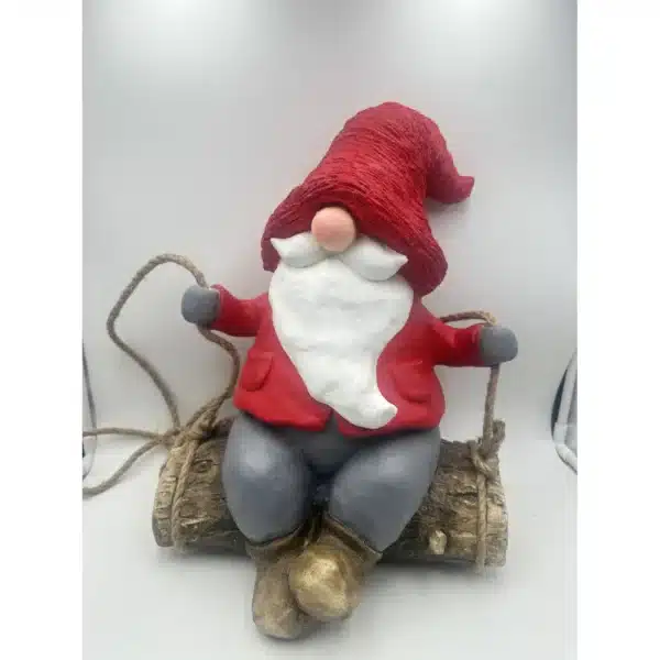Gnome sur bûche. 42cm. rouge CARREFOUR